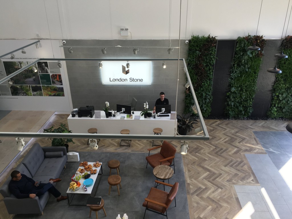 North London Showroom front desk, Green Living Wall and refreshment and seating area