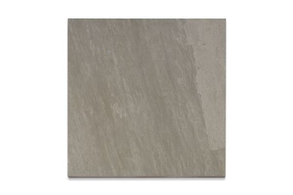 Single Kandla Grey 16mm porcelain paving slab, viewed from above, showing texture and markings including imitation riven surface.  ***