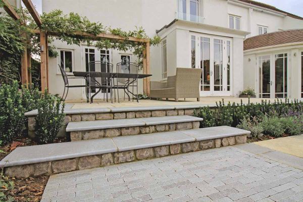 Rendered image of Antique Grey Limestone Bullnose Step at 900x500mm, showing a bullnosed edge perfect for building steps.***