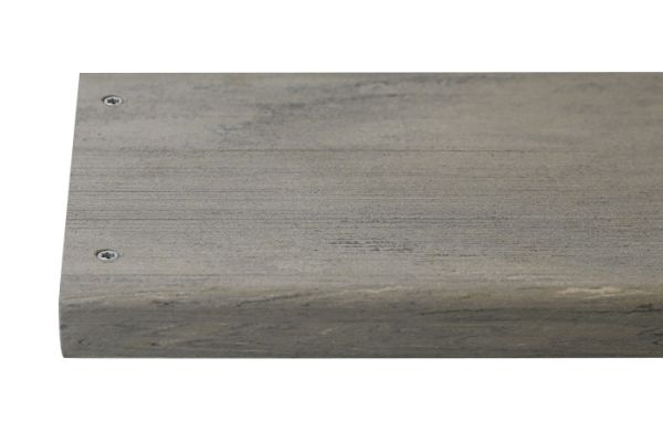 Luna composite decking board with two Luna colour match screw fixed to the far left face of the board.***
