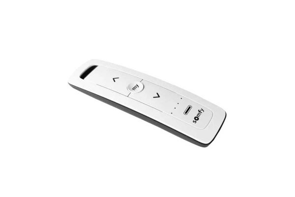 Somfy 5 IO Pure Handset on white background, with five channels for managing LED lighting, heaters, and shade blinds on Deluxe Pergolas.***