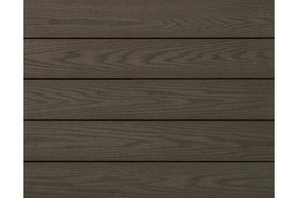 Close-up of square of Ebony Grey Millboard composite decking, showing deep charcoal tones and textured finish.***
