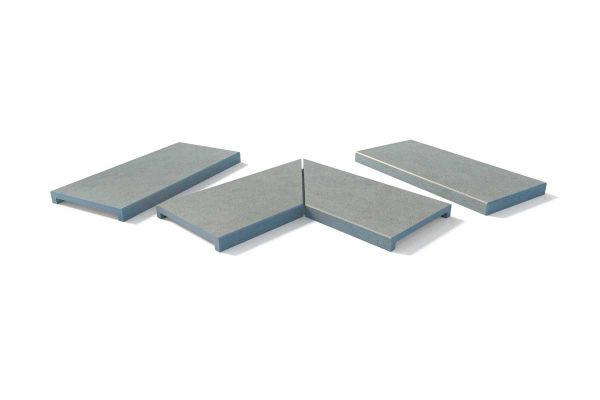 Grey Yorkstone downstand copings shown in straight, end, and corner formats. Adds visual weight to wall profiles.***