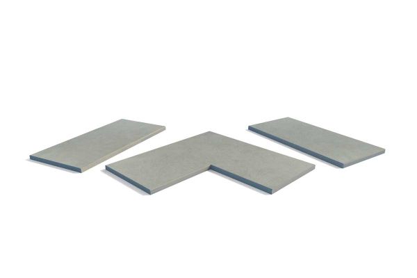 Grey Yorkstone porcelain pencil round copings displayed as full collection. A soft-edge option for a relaxed wall design.***
