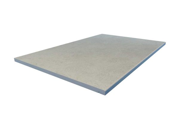 Pencil round Grey Yorkstone porcelain step with gently curved edge and subtle colour variation. A soft finish for modern spaces.***