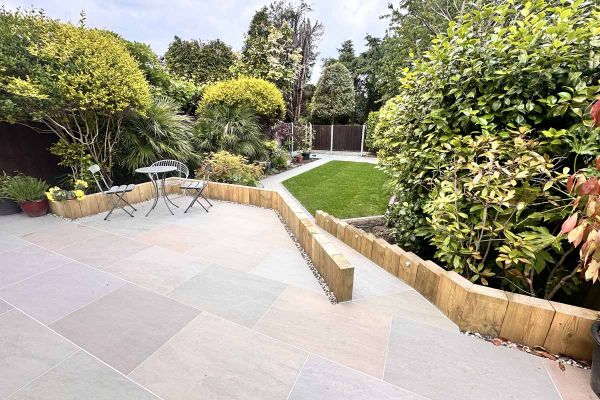 Single Raj Green 16mm porcelain paving slab, viewed from above, showing texture and markings including imitation riven surface.***