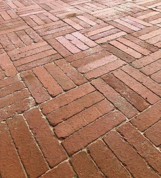 Close view of Spalding clay pavers from the Alpha collection, laid in blocks of 4 at right angles to each other.***Florence Gardening, www.florencegardening.co.uk

