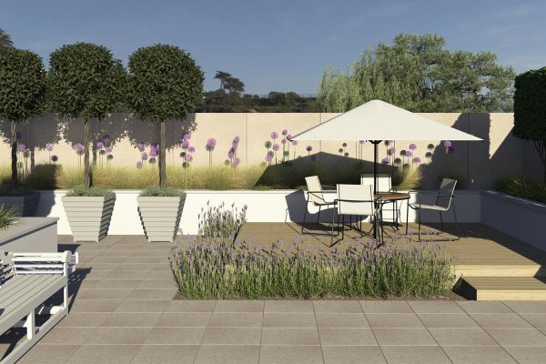 Decked seating area edged with Frosty Grey Porcelain garden tiles UK and plants on 2 sides. White raised bed with alliums behind.***Render