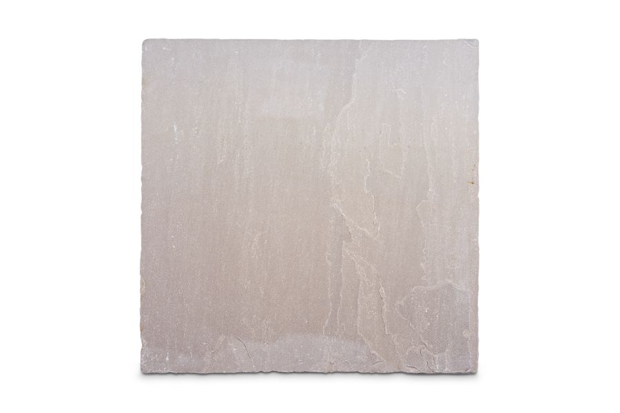 Single Raj Green tumbled sandstone slab, seen from above on white background, showing riven surface texture.
