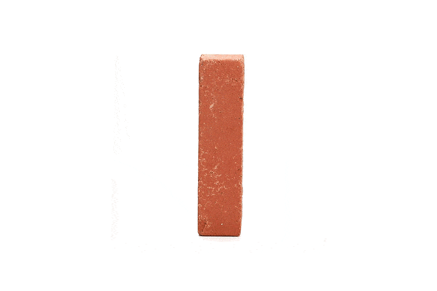 Single orangey-red Spalding clay brick paver standing upright and revolving. Free UK delivery available.