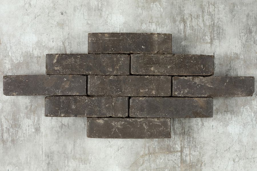 Nine brick pavers laid in an offset pattern, to show off the Charcoal Grey Clay Paving colour and texture.