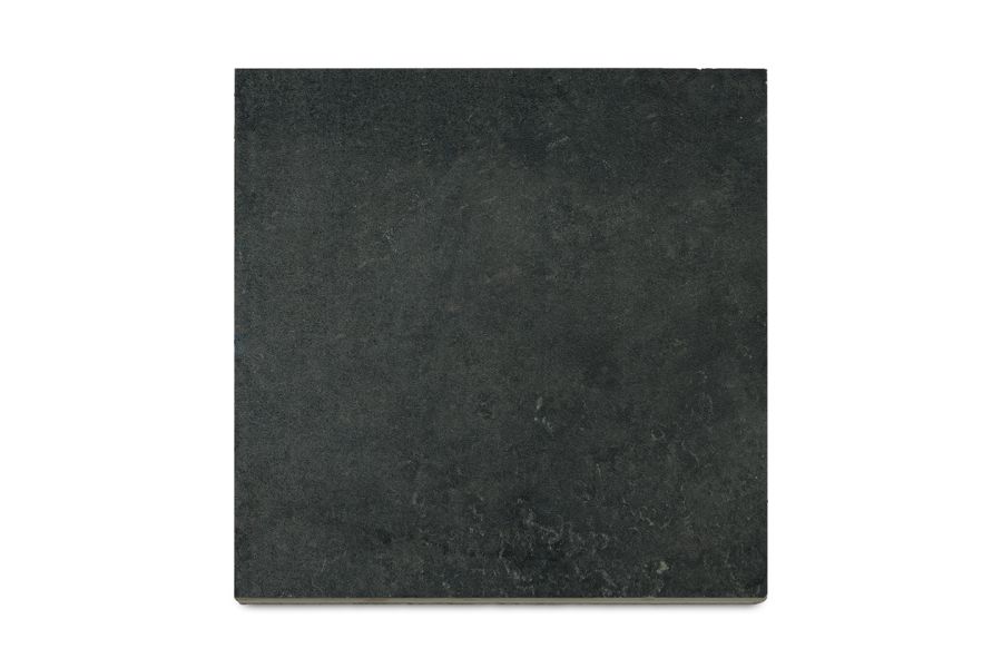 Square of Charcoal porcelain seen from above to show deep colour of plank paving. Free grout and primer supplied.