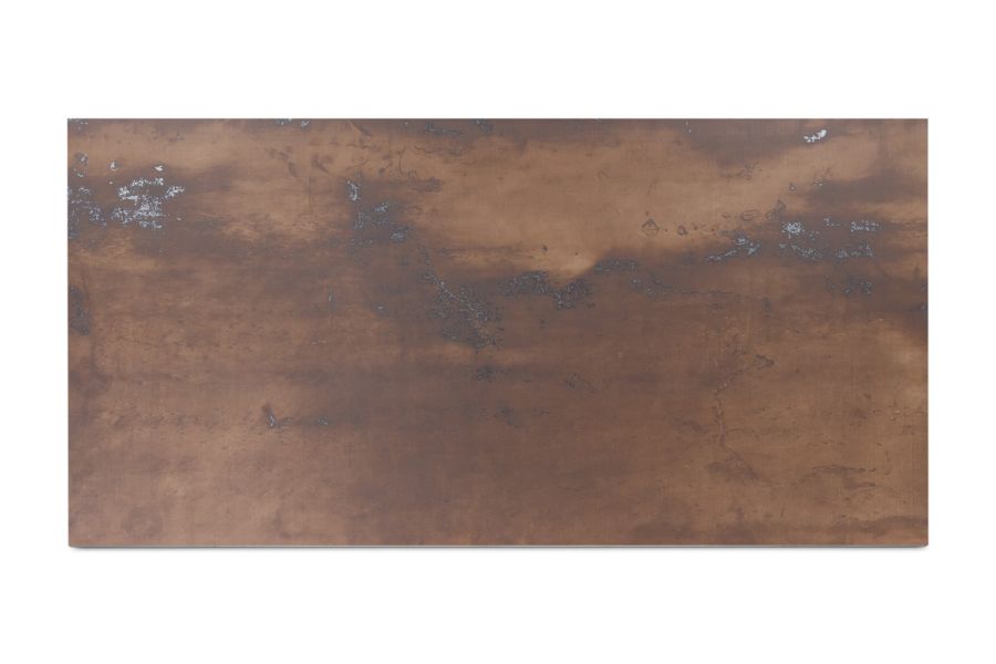 Single panel of Siena Copper 1200x600 porcelain external cladding, showing metallic-type markings and brown tones.