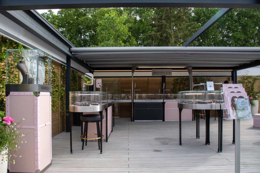 Boodles trade stand, built by Garden House Design, RHS Chelsea 2022, with jewellery display cases on Luna Classic DesignBoard.
