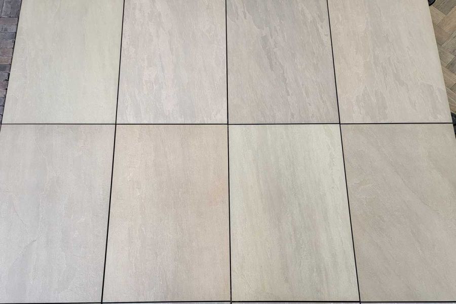 Witness the precise edges and varied colours of Raj Green Porcelain Paving slabs. Perfect for roof terraces and balconies, installed on pedestals.
