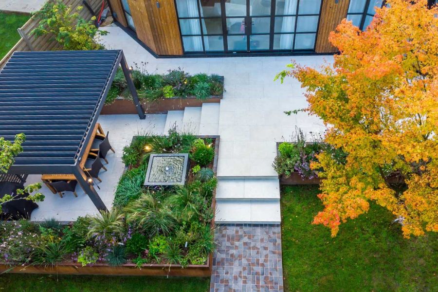 Birds eye view of florence white porcelain paving outdoor tiles UK used as steps and slabs. Design and build  by Kitti Kovacs.