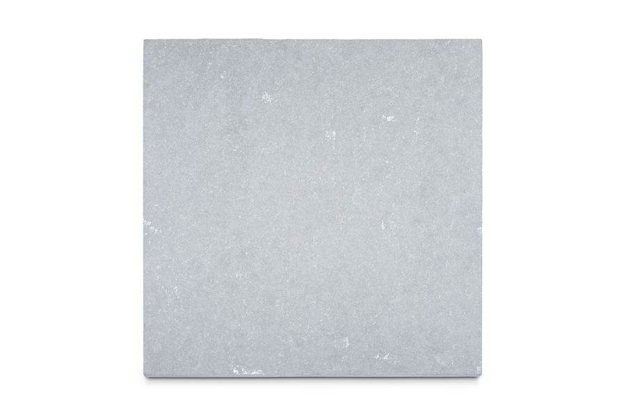 Single Kota Blue limestone slab seen from above, showing surface texture and light flecks. Free UK delivery available.