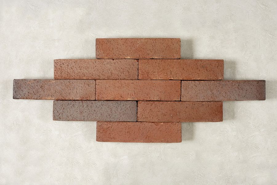 9 Bromley clay pavers arranged in lozenge shape, showing red tones with grey touches. Free UK delivery available.