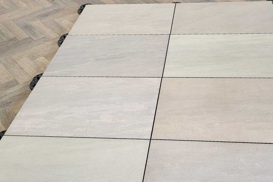 Admiring the close-up views of Raj Green Porcelain Paving slabs. Witness the traditional appeal and modern advantages of these Garden Tiles UK.