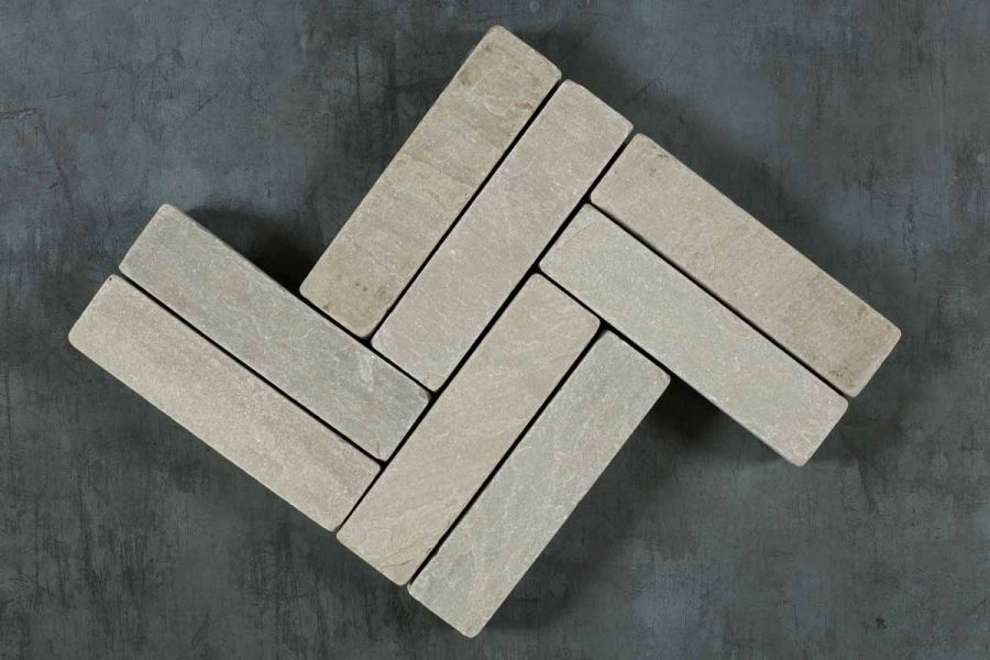 8 Kandla Grey sandstone patio bricks placed in pairs to create a double zigzag pattern. Free UK delivery available.
