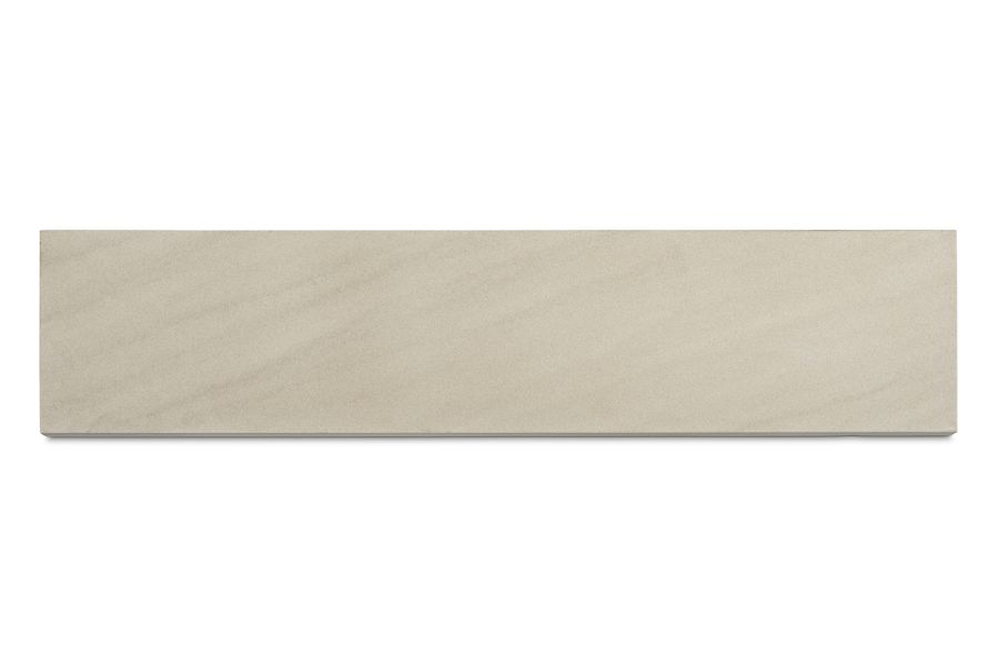 Single Beige smooth sandstone plank, seen from above on white background, showing grey and black flecked colouring and shape.