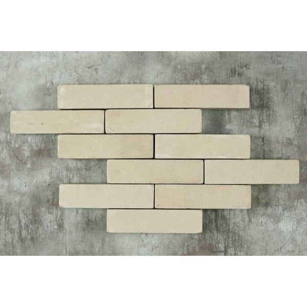 11 Beige sandstone patio bricks laid in 6 rows of 1 or 2 pavers on a dark background. Free UK delivery available.***
