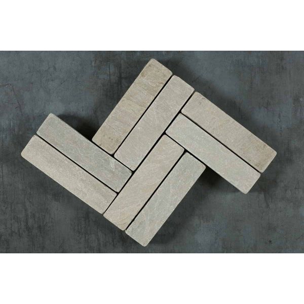 8 Kandla Grey sandstone patio bricks placed in pairs to create a double zigzag pattern. Free UK delivery available.***