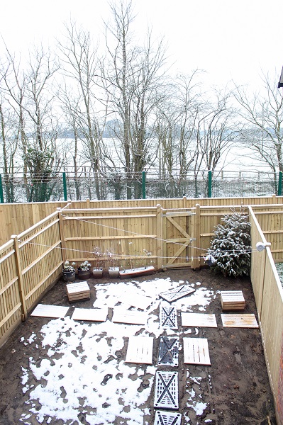 Back garden with snow, ready to have sub base laid. 