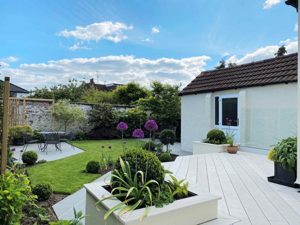 An alternative garden paving option, DesignBoard composite deckin is a low-maintenance option. Designer Dee Stewart chose Silver for this garden patio, built by Brockstone