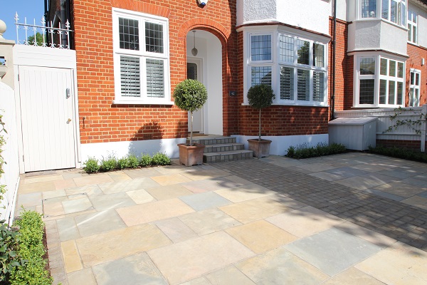 Small Edwardian terrace house with Kota Brown limestone hard standing in front.