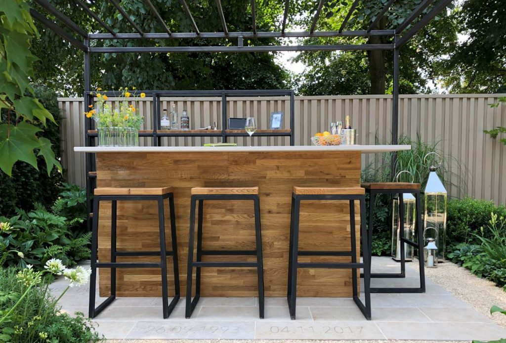 The Landform Garden Bar featuring engraved elements