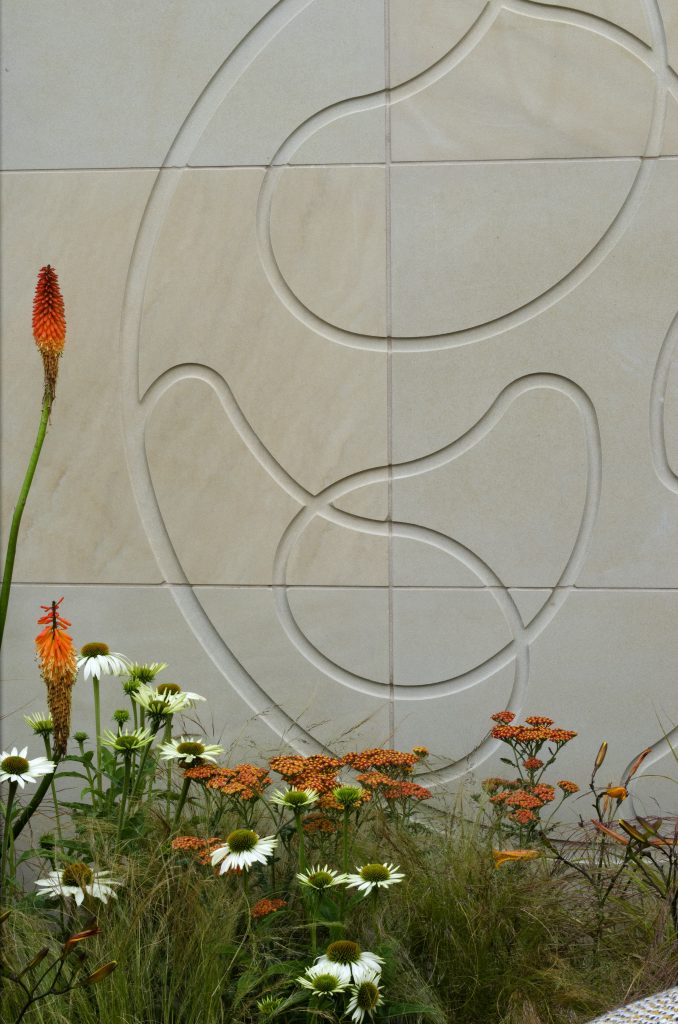 Bespoke sculpture of slabs of Harvest Sawn sandstone with bespoke engraving in Phytosanctuary Garden, RHS Tatton Park.