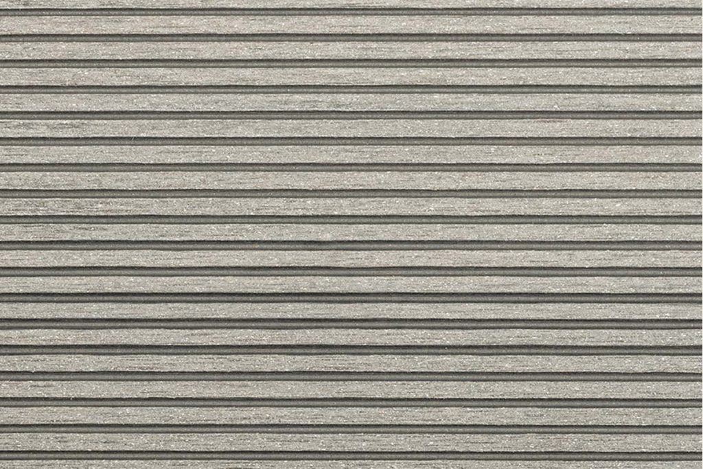 Close up of Grooved composite decking in Pebble Grey.