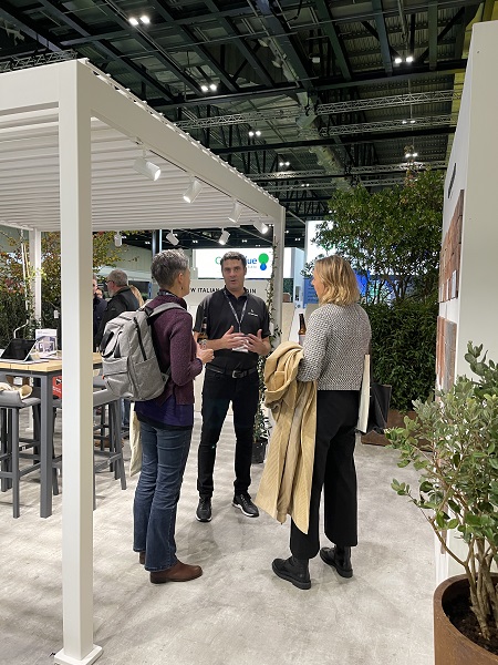 2 customers talk with Landscape Consultant Stuart Williams on stand at Futurescape 2022