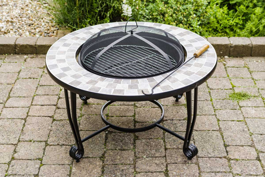 A charcoal firepit is a stylish addition to the garden as well as producing plenty of heat. 