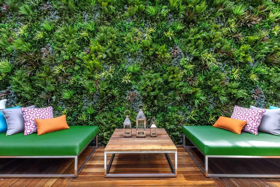 Artificial green walls will transform a dull space to a bright and inviting space.
