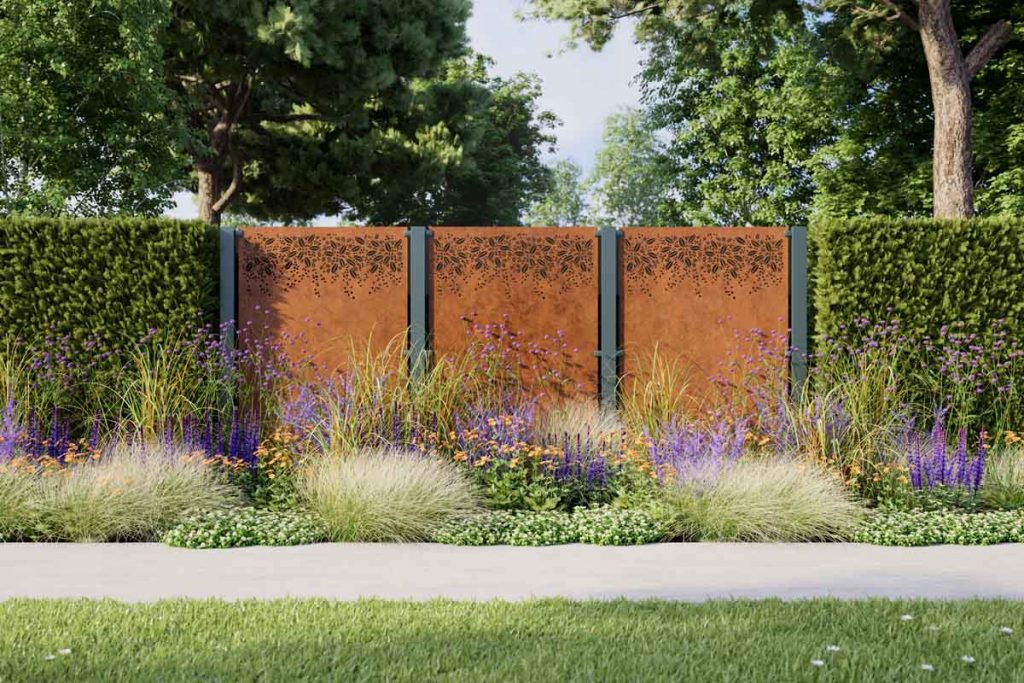 Three metal garden screens sit side by side, surrounded by hedging to improve the noise pollution in this outdoor space.