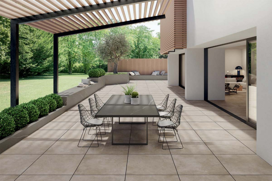 Area 800x800mm Porcelain Paving is used for the paving in this covered garden seating area.