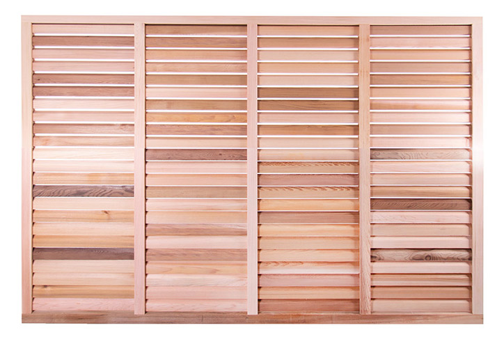 Deco framed cedar wood fence panel with beveled edges to the slats