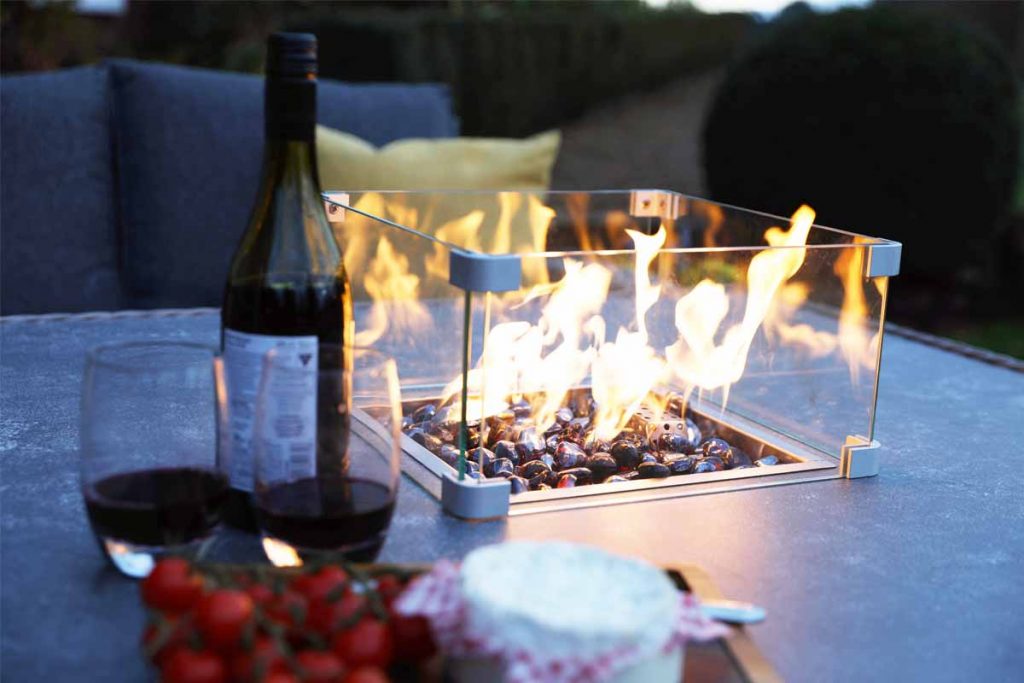 Gas-powered fire pit in middle of table of Catalan Mini Modular Lounge Set