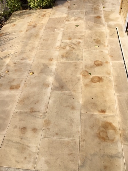 Very dirty Beige sawn sandstone patio