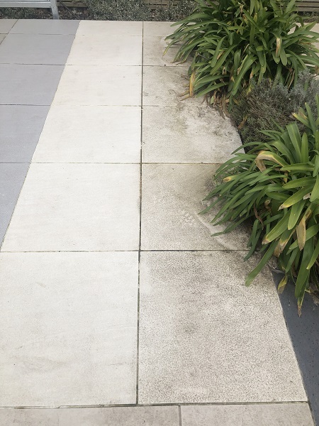 2 rows of laid Porcelain outdoor tiles, one cleaned, one dirty