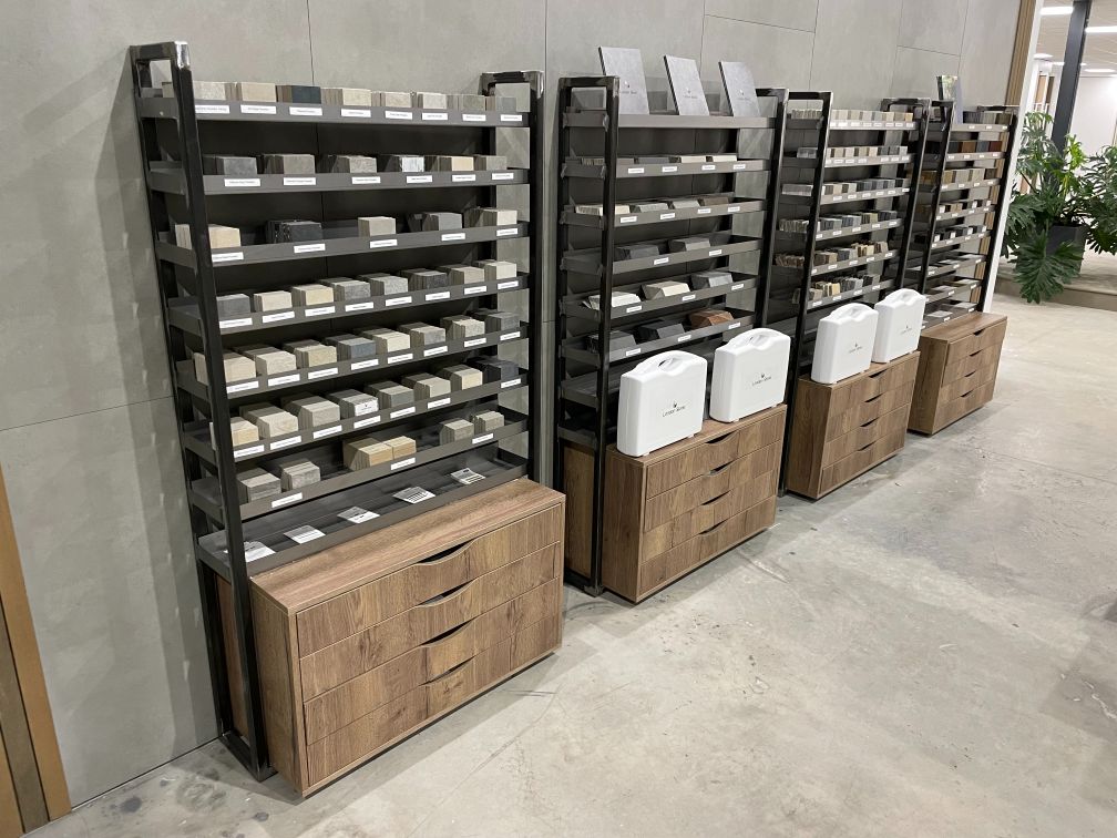 Stands of paving samples against wall in Birmingham showroom