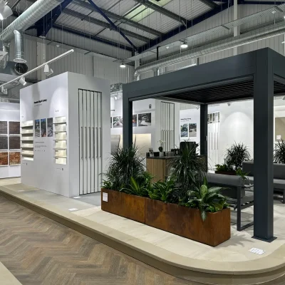 Interior of London Stone's Milton Keynes showroom with pergola and sliders.