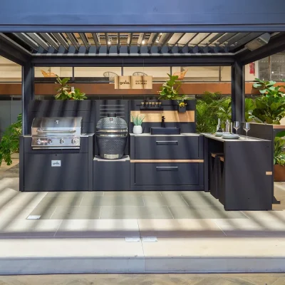 Pergola over Grillo outdoor kitchen in London Stone's Surrey showroom.