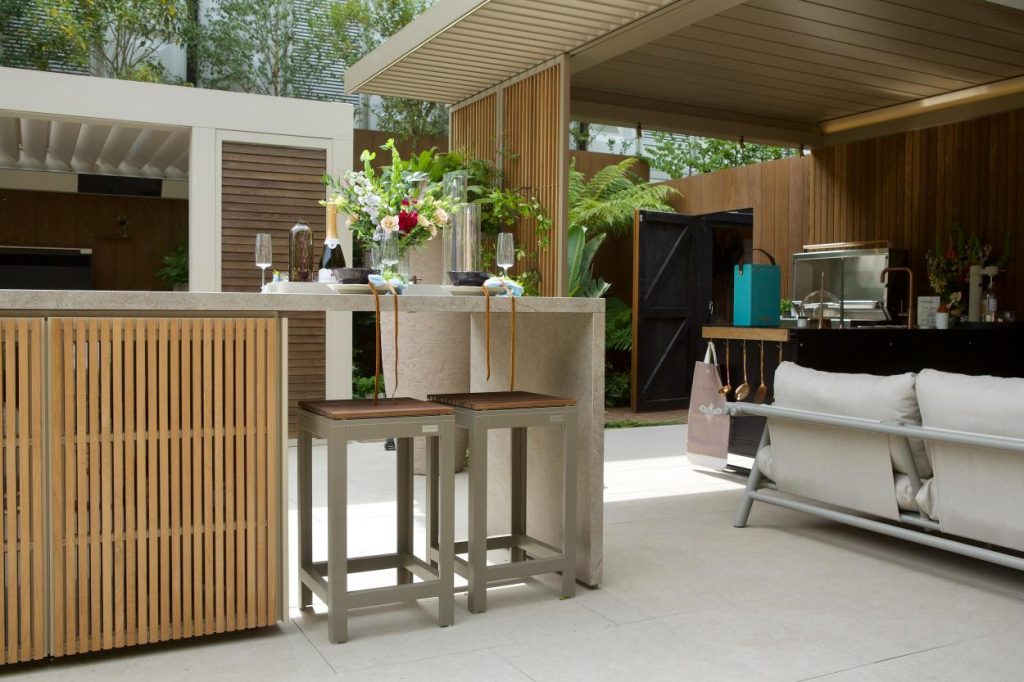 Garden House Design trade stand, RHS Chelsea with outdoor kitchen, Egyptian Beige porcelain paving