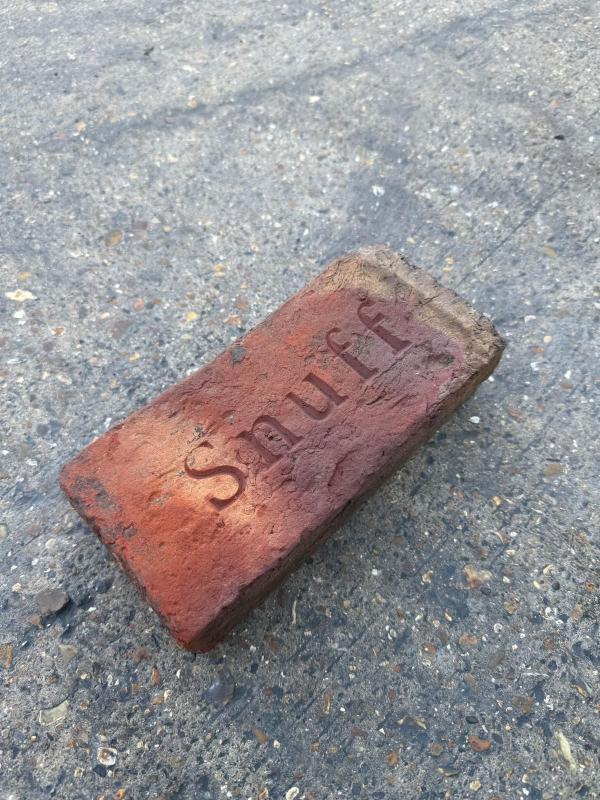 Engraved paver with name Snuff, the King's dog