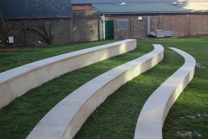 Laser-templated curved terrace built by Langdale Landscapes.