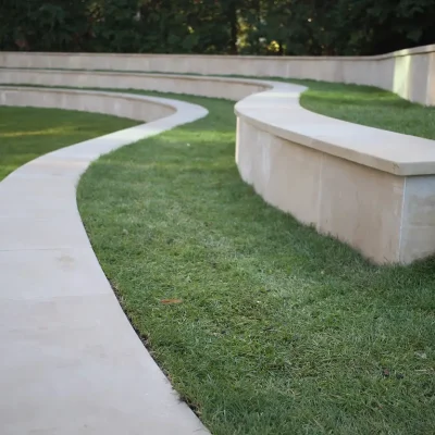3 parallel terraces edged with Yorkstone to make amphitheatre