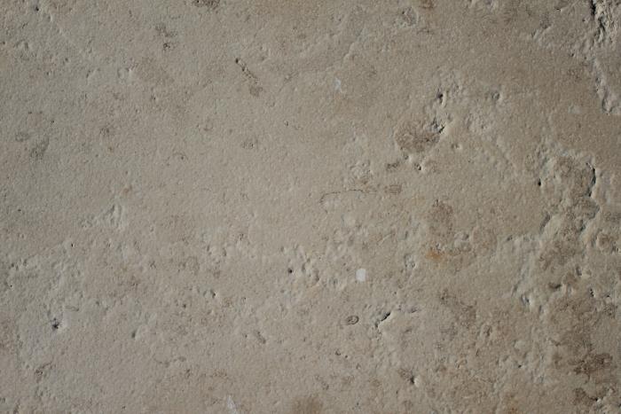 Jura Beige Limestone, sandblasted and brushed, shown in close-up